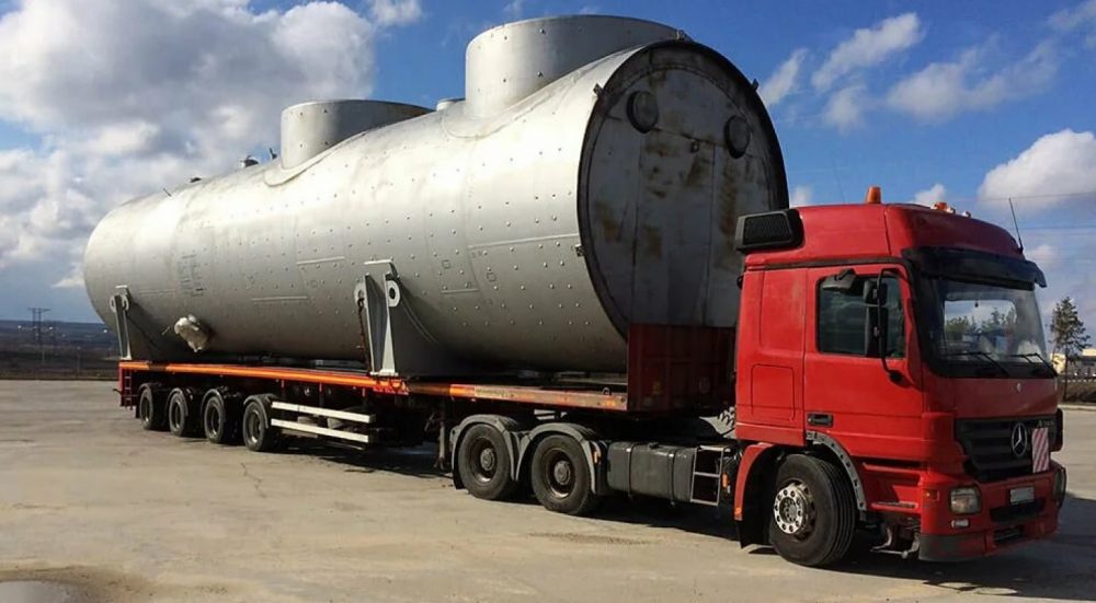 Перевозка негабаритных емкостей и цистерн на трале стоимость услуг и где заказать - Тырныауз